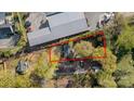 Aerial view showcasing the property layout, boundary, and location next to commercial building at 2201 Grimes St, Charlotte, NC 28206