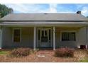 Charming single-story home with a covered front porch and a brick foundation at 418 W Cemetery St, Salisbury, NC 28144