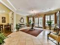 Spacious lobby with tile flooring, chandelier, and tastefully decorated seating area exudes sophistication at 5425 Closeburn Rd, Charlotte, NC 28210