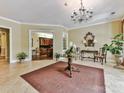 Elegant lobby featuring tile floors, chandelier, and sophisticated decor creates a welcoming atmosphere at 5425 Closeburn Rd, Charlotte, NC 28210