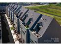 Rooftop terraces with outdoor seating offer stunning views at 6002 Fonsac Ln # 2006E, Charlotte, NC 28217