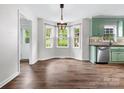 Bright eat-in kitchen with bay windows and stainless steel appliances at 730 Cove Rd, Gastonia, NC 28052