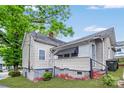 Side and rear view of home showing yard at 117 Young Sw Ave, Concord, NC 28025