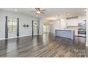 Bright living room featuring modern flooring, recessed lighting, and a contemporary open-concept design at 138 Lanyard Dr # B, Mooresville, NC 28117