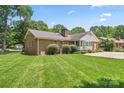 Large, well-maintained backyard featuring lush green grass at 2715 Kennetuck Ct, Charlotte, NC 28273