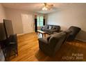 Cozy living room boasts a soft couch, natural light, and a serene atmosphere at 405 Jose St, Shelby, NC 28150
