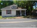 Exterior of a house featuring a covered porch with columns and visible street view at 421 W Cemetery St, Salisbury, NC 28144