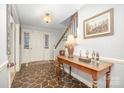 Inviting foyer featuring unique tile flooring and classic decor at 4630 Woodleaf Rd, Salisbury, NC 28147