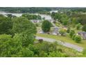 Scenic aerial view of a lakeside community with lush greenery and beautiful waterfront access at 466 Shiloh Church Rd, Hickory, NC 28601