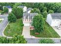 Aerial view of a two-story home with an attached garage and a well maintained lawn at 1503 Stoney Ct, York, SC 29745