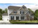 Charming two-story home features a stone entryway, white siding, black shutters, and a well-manicured lawn at 18145 Sulton Ter, Huntersville, NC 28078