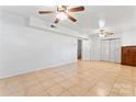 Spacious finished basement with ceramic tile floors and ample closet space at 2255 Milton Rd, Charlotte, NC 28215