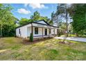 Attractive house featuring nice yard and a newly built concrete driveway at 253 Hall Nw Ave, Concord, NC 28027