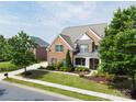 Beautiful home with manicured lawn, mature trees, and inviting curb appeal in a desirable neighborhood at 2812 Julian Glen Cir, Waxhaw, NC 28173