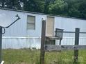 Exterior of a home with a small porch and satellite dish at 3234 Legend Rd, Lancaster, SC 29720