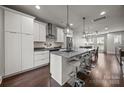 Stylish kitchen featuring modern cabinets, stainless steel appliances and a large island at 336 Uptown West Dr, Charlotte, NC 28208