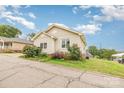 Lovely single-story home with vinyl siding and colorful landscaping, showcasing a charming exterior at 380 Woodlawn Ave, Cramerton, NC 28032