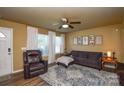 Cozy living room features a comfortable sofa, recliner, and a stylish area rug at 4075 Clover Nw Rd, Concord, NC 28027