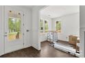 New construction foyer with beautiful millwork and view to the front porch at 4315 Palm Dr, Denver, NC 28037