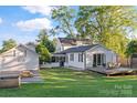 Expansive backyard featuring a deck with patio furniture, perfect for outdoor entertaining at 1020 12Th Nw Ave, Hickory, NC 28601