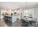 Spacious kitchen with white cabinetry, an island with seating, and stainless steel appliances at 13338 Blanton Dr, Huntersville, NC 28078
