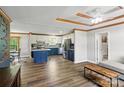 Stylish kitchen with white and blue cabinets, stainless steel appliances, and a functional island at 2021 Beamguard Rd, Clover, SC 29710