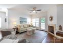 Comfortable living room with ample seating and a fireplace feature at 2412 Chesterfield Ave, Charlotte, NC 28205