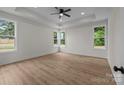 Bright and airy main bedroom featuring recessed lighting, a ceiling fan, and lots of windows at 4975 Rimer Rd # 1, Concord, NC 28025