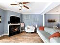 Open living area features a cozy fireplace, hardwood floors, and a comfortable seating arrangement at 556 Knighton Hill Rd, Rock Hill, SC 29732