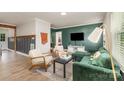 Stylish living room featuring a modern sofa, decorative accents, and ample natural light at 2601 Ashley Rd, Charlotte, NC 28208