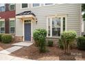 Inviting townhouse with well-maintained landscaping and a cozy front porch at 3039 Potomac River Pkwy, Charlotte, NC 28217