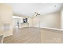 Spacious living room featuring modern flooring and ample natural light at 3039 Potomac River Pkwy, Charlotte, NC 28217