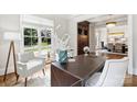 Bright office with large windows, stylish decor, and a view of the front yard at 9104 Kingsmead Ln, Waxhaw, NC 28173