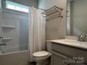 Clean bathroom featuring a shower and tub combo, vanity, and chrome fixtures at 147 Dubois Dr, Mooresville, NC 28115