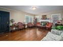 Inviting living room with hardwood floors, fireplace, and natural light at 411 Hanna St, Gastonia, NC 28052