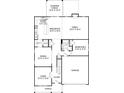 Detailed first-floor plan highlighting the layout of the kitchen, living spaces, and garage at 423 Balboa St, Matthews, NC 28104
