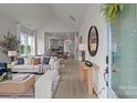 Bright living room with modern furnishings and wood floors at 4419 Splash Trl # 158, Sherrills Ford, NC 28673