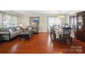 Spacious living room and dining room with wood floors and natural light at 512 Nanny Point Dr, Monroe, NC 28110