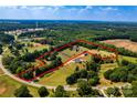 Expansive aerial view of the property with defined boundaries and surrounding lush greenery at 5258 E Bandys Cross Rd, Catawba, NC 28609