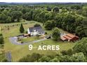 A sprawling property with 9 +/- acres featuring a well-maintained home and serene surroundings at 5258 E Bandys Cross Rd, Catawba, NC 28609