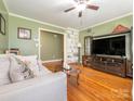 Cozy living room with hardwood floors, neutral colors, and comfortable furnishings at 5629 Ruth Dr, Charlotte, NC 28215