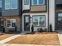 Charming townhome exterior with modern design and well-maintained landscaping at 5731 Castlerea Dr, Charlotte, NC 28217