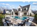 Beautiful pool and spa area with outdoor seating, perfect for entertaining and relaxation at 7215 Alexander Rd # 4, Charlotte, NC 28270