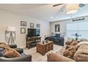 Cozy living room with comfortable couches and a television, perfect for relaxing at 2112 Balting Glass Dr, Indian Trail, NC 28079