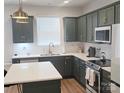 Stylish kitchen with modern appliances, sleek countertops, and ample cabinet space at 320 Lawrence Gray Rd, Charlotte, NC 28262