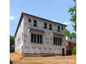 Exterior view showcasing new construction with large windows and Tyvek HomeWrap at 5615 Lantana Ave # B, Charlotte, NC 28205