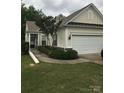 Delightful one-story home with an attached two-car garage, manicured lawn, and carefully maintained landscaping at 19157 Mallard Dr, Fort Mill, SC 29707