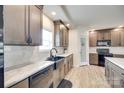 Kitchen featuring stainless steel appliances, marble countertops, modern cabinets, and pantry at 2268 Westbrook Rd, Edgemoor, SC 29712