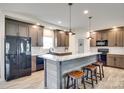 Stylish kitchen with a large center island, modern appliances, pendant lighting, and ample cabinet space at 2268 Westbrook Rd, Edgemoor, SC 29712