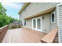 Spacious wooden deck accessible via double doors, perfect for outdoor entertaining at 2728 Touchstone Cir, Newton, NC 28658